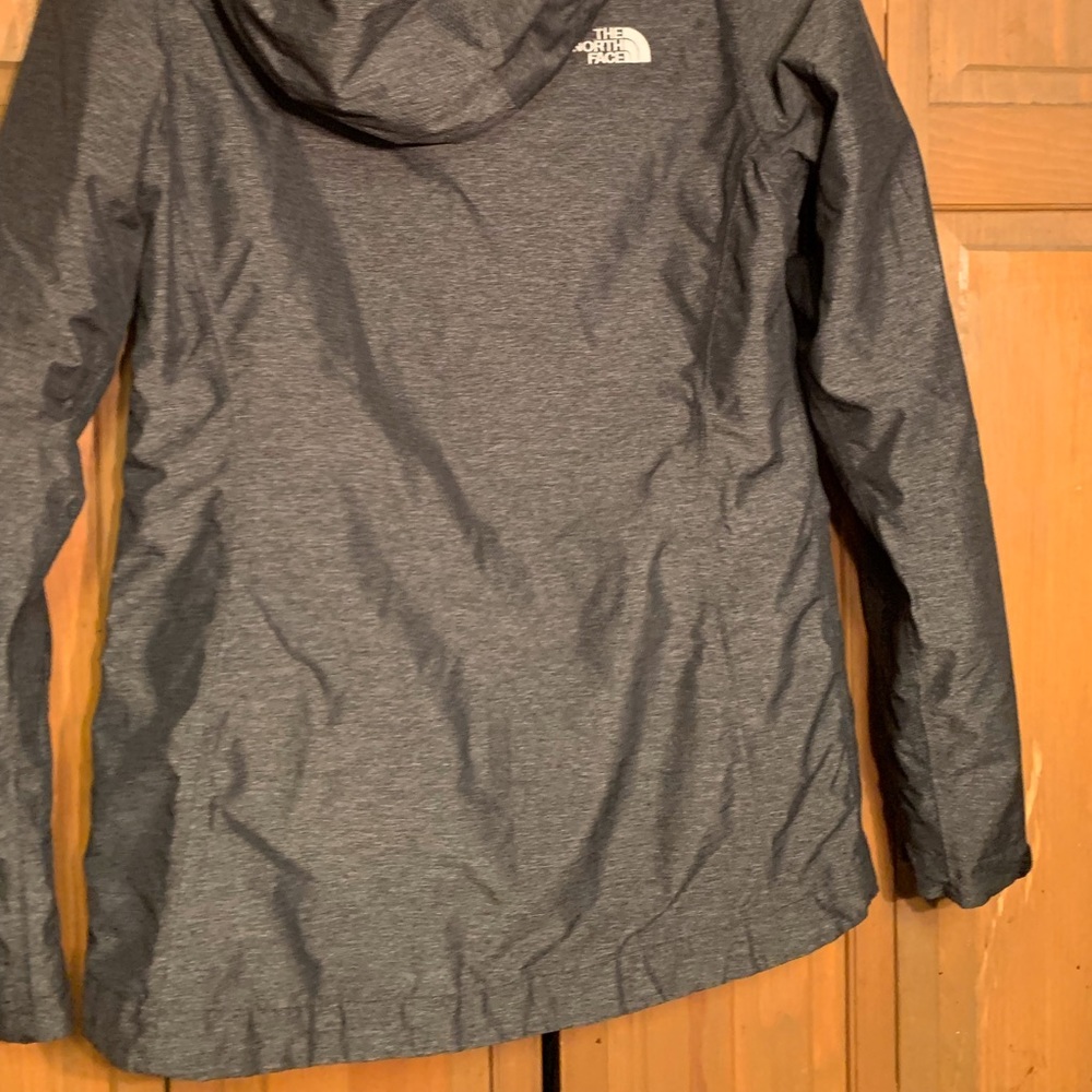 Used North-Face jacket black with grey undertones, size small, Retail $198.00